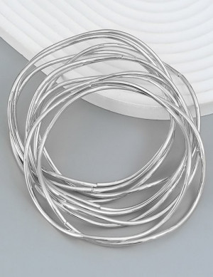 Набор жестких браслетов из тонких золотистых колец Z68106 Набор жестких браслетов из тонких золотистых колец Z68106