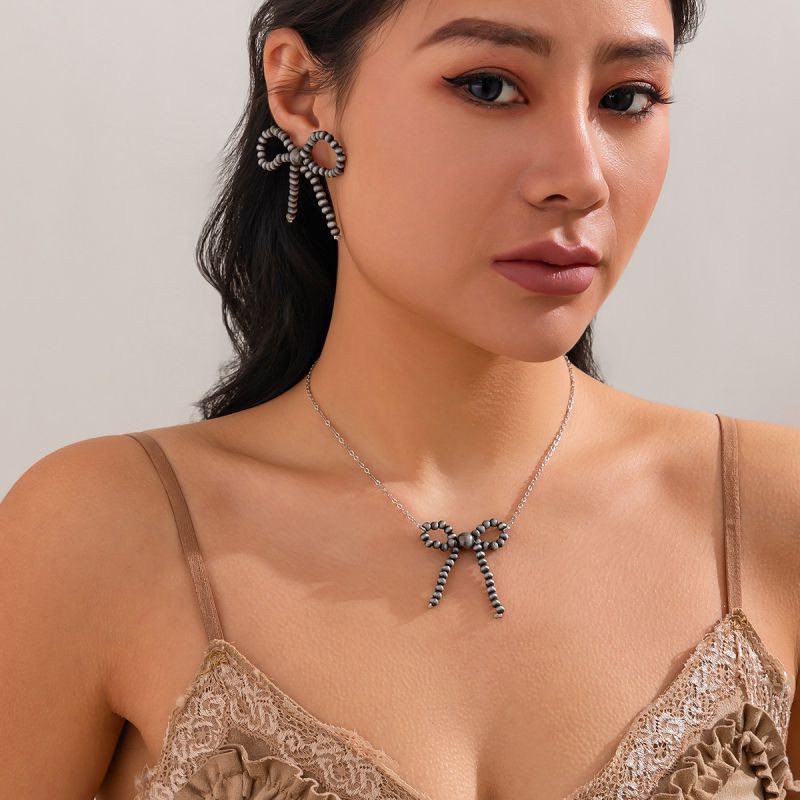 Тонкая цепочка с подвеской в форме изящного банта CJL23009