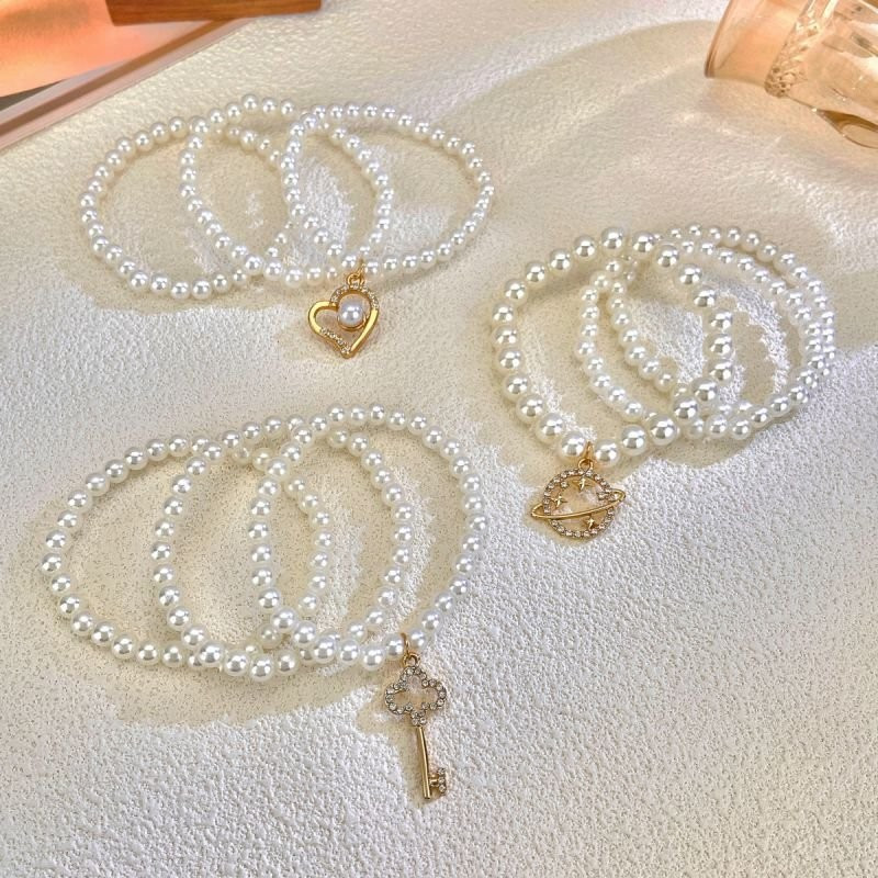 Браслет многорядный из жемчуга с сердцем CJC14338