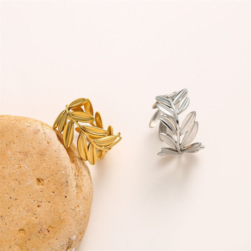 Разомкнутое кольцо-веточка с серебристыми листьями 1J12376CJJ Разомкнутое кольцо-веточка с серебристыми листьями 1J12376CJJ