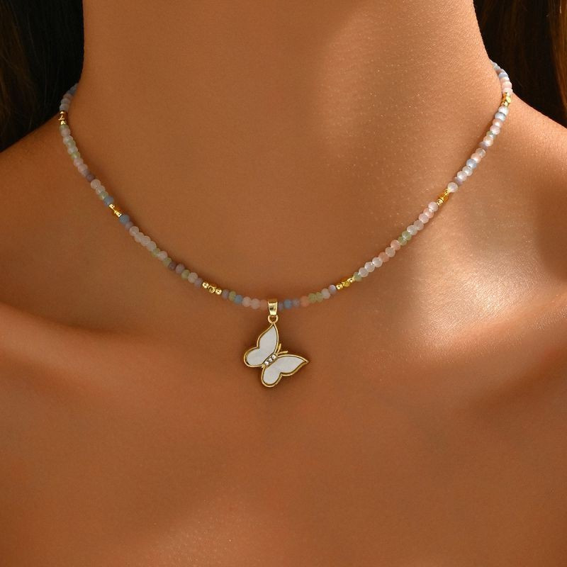 Чокер из бусин с подвеской-бабочкой из перламутра CJG30596 Чокер из бусин с подвеской-бабочкой из перламутра CJG30596