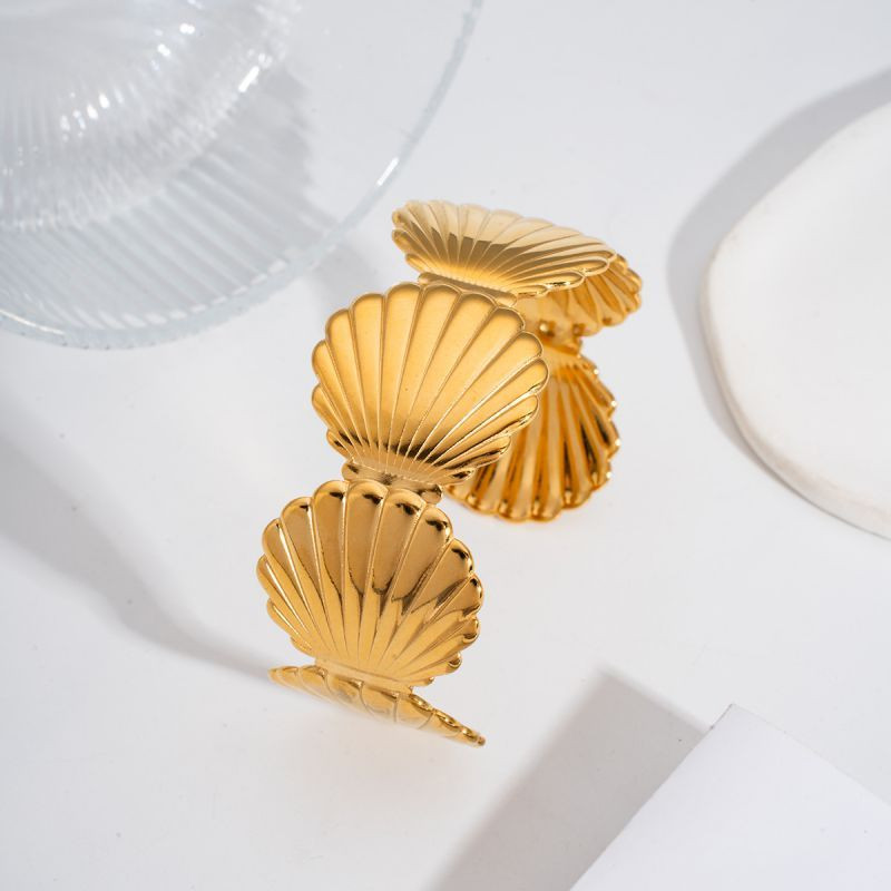 Браслет жесткий в форме золотистых раковин CJL84040 Браслет жесткий в форме золотистых раковин CJL84040