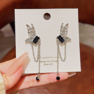 Серьги-подвески с бантами и темными кристаллами N85886 Серьги-подвески с бантами и темными кристаллами N85886