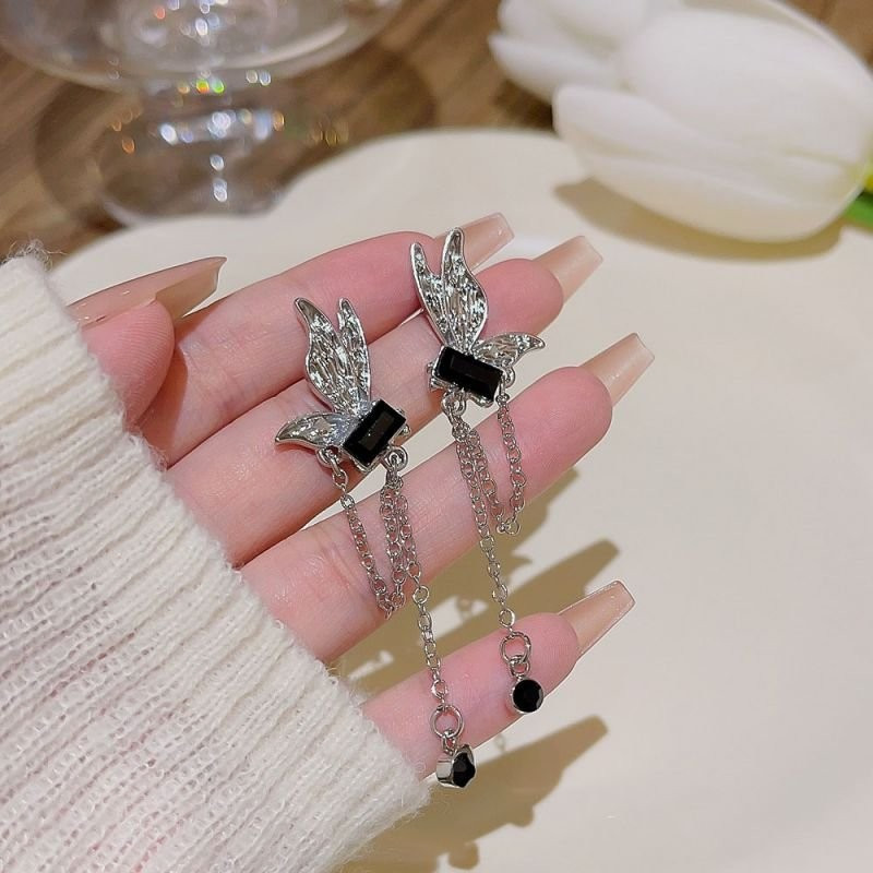 Серьги-подвески с бантами и темными кристаллами N85886