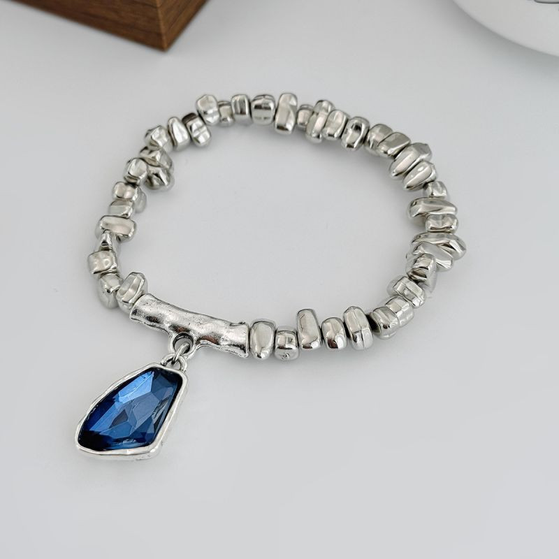 Браслет из серебристых бусин с синим кристаллом CJT25645 Браслет из серебристых бусин с синим кристаллом CJT25645