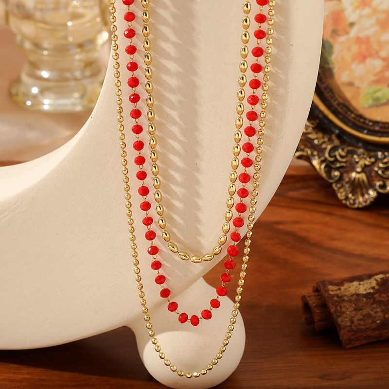 Золотистая цепочка с цветными камнями CJN90608