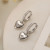 Серебристые серьги-кольца с гладкими сердцами N99091