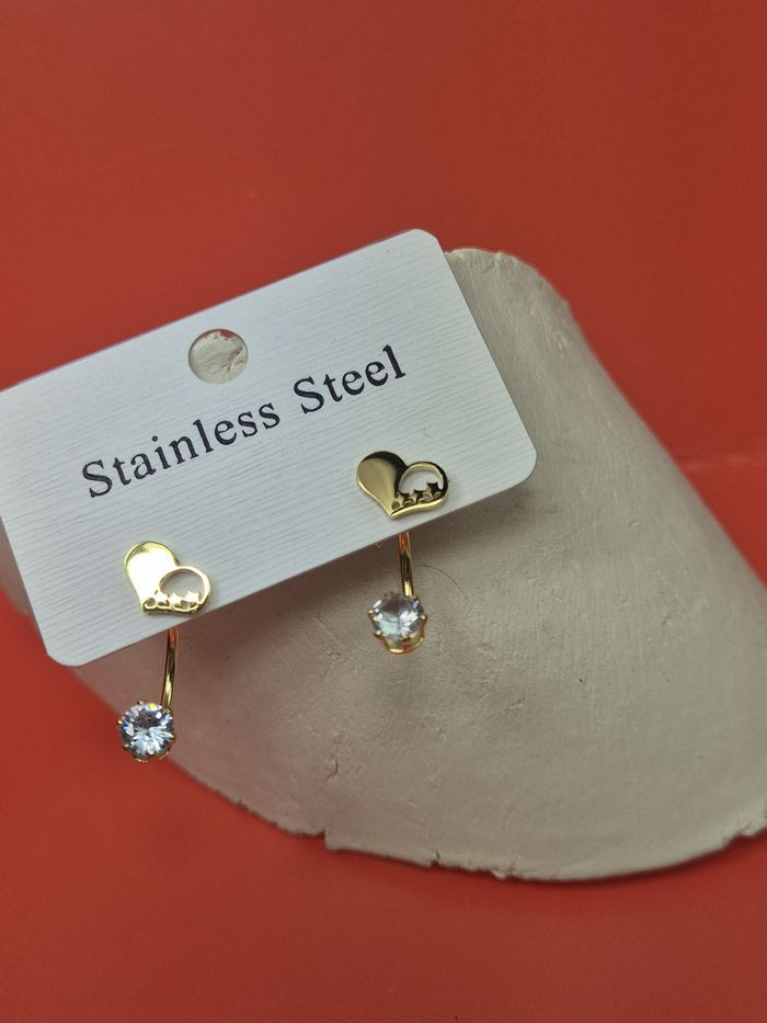 Золотистые стальные серьги-джекеты Лаконичные сердца с фианитом 1J11514CJJ