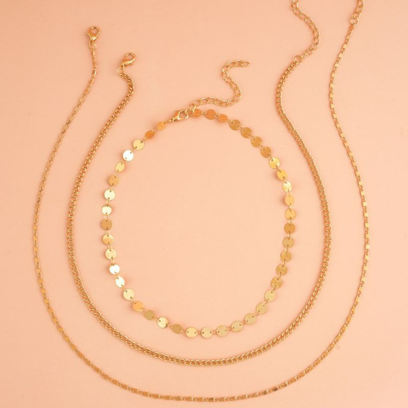 Многорядное колье из плоских золотистых дисков CJP85029