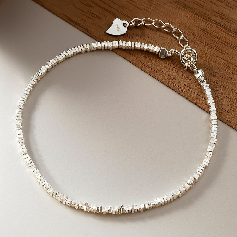 Браслет жесткий с фактурной поверхностью 1J12178CJJ