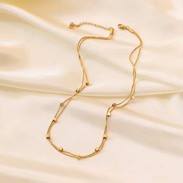 Длинная цепочка с золотистыми кубиками-вставками J10637CJJ Длинная цепочка с золотистыми кубиками-вставками J10637CJJ