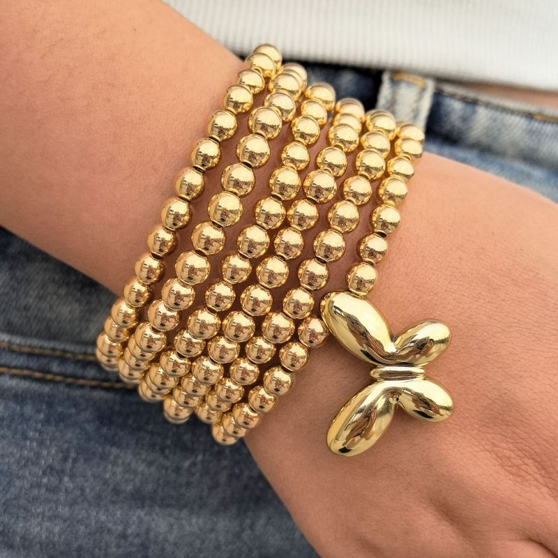 Браслет многорядный из золотистых бусин с бабочкой CJN32365