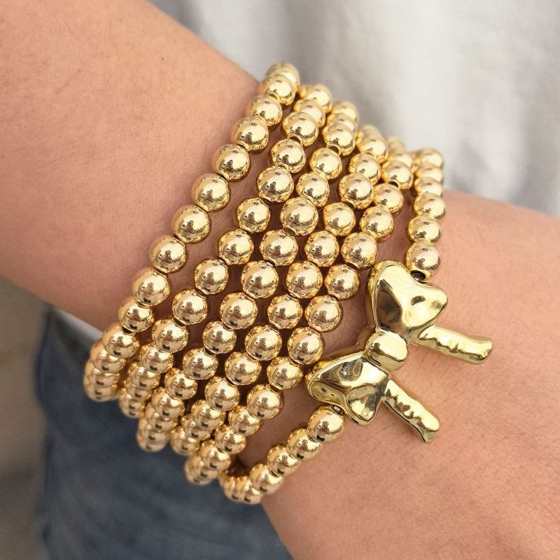 Браслет многорядный из золотистых бусин с бабочкой CJN32365