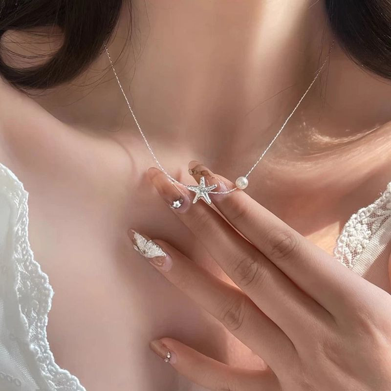 Цепочка с подвеской в форме морской звезды и жемчужиной 1J12390CJJ Цепочка с подвеской в форме морской звезды и жемчужиной 1J12390CJJ