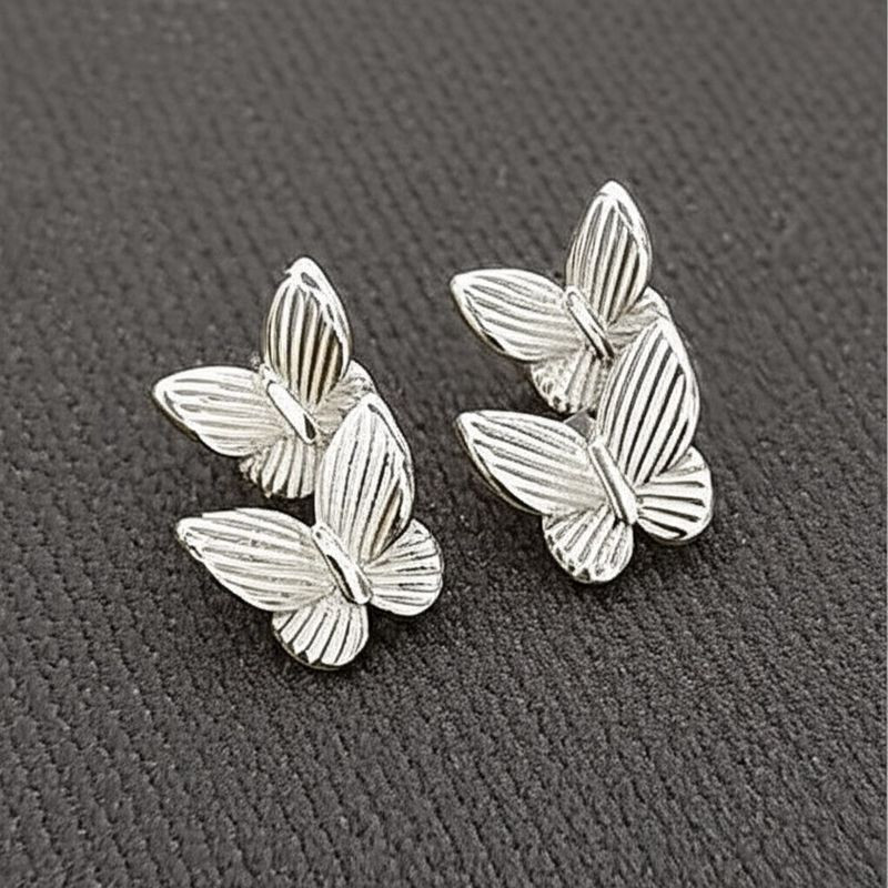 Миниатюрные серьги-пусеты серебристые бабочки 1J11830CJJ Миниатюрные серьги-пусеты серебристые бабочки 1J11830CJJ