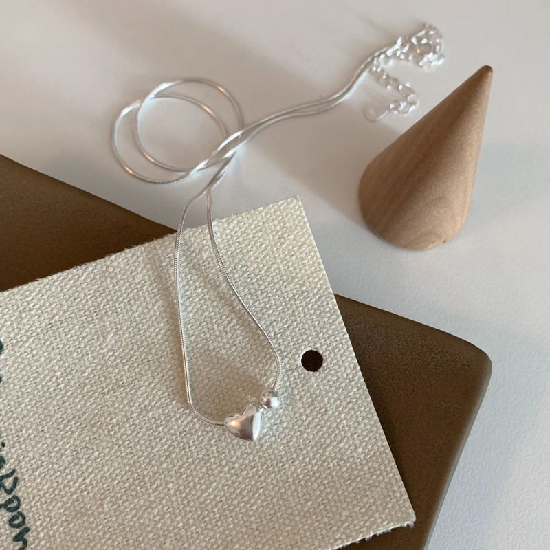 Минималистичная цепочка с объемной подвеской-сердцем 1J12392CJJ Минималистичная цепочка с объемной подвеской-сердцем 1J12392CJJ