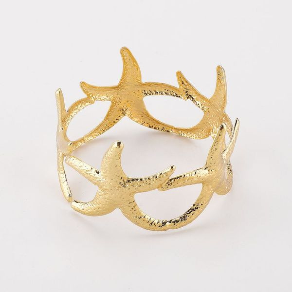 Браслет жесткий разомкнутый в форме золотистой звезды CJL02911 Браслет жесткий разомкнутый в форме золотистой звезды CJL02911