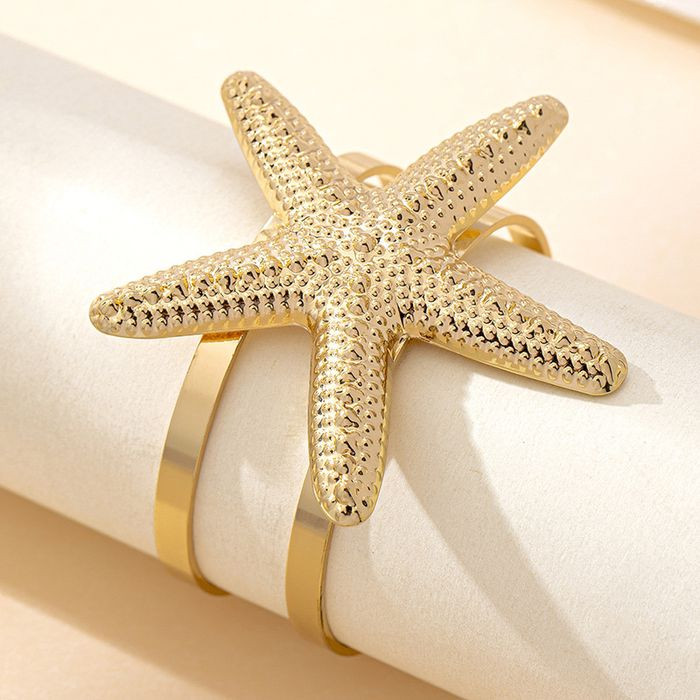 Браслет жесткий кафф с крупной морской звездой CJM86356