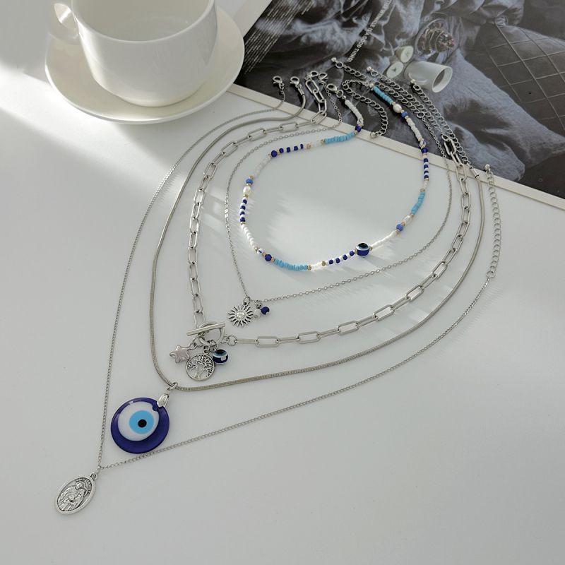 Четырехуровневое колье со вставками синего бисера и медальонами CJS98357