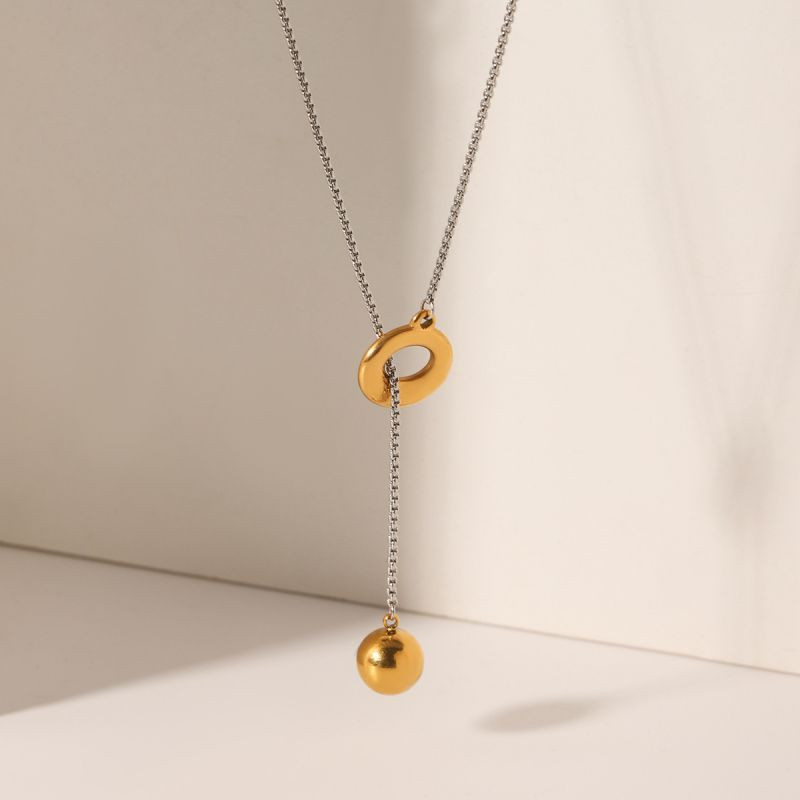 Золотистое колье-галстук с кольцом и сферой CJL78824 Золотистое колье-галстук с кольцом и сферой CJL78824