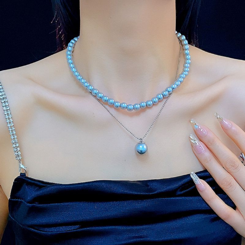 Многослойное колье с крупным жемчугом и декоративными цепями CJM18331