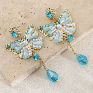 Нарядные серьги в форме бабочек с голубыми кристаллами CJL17008 Нарядные серьги в форме бабочек с голубыми кристаллами CJL17008