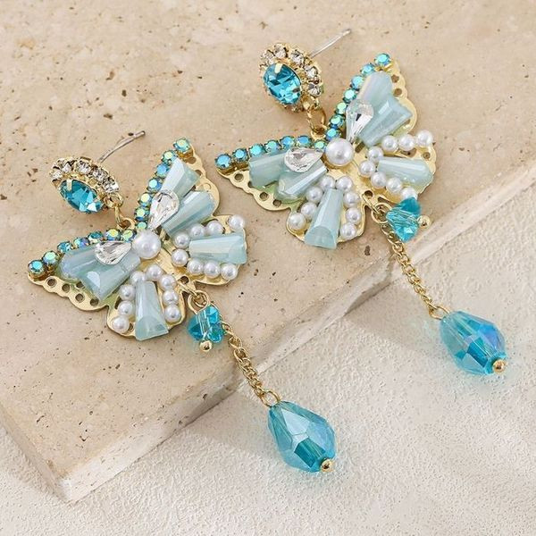 Нарядные серьги в форме бабочек с голубыми кристаллами CJL17008 Нарядные серьги в форме бабочек с голубыми кристаллами CJL17008