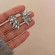 Серебристые фактурные серьги-пусеты Листья из ювелирного сплава 1J11733CJJ