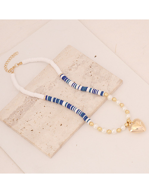 Контрастное колье из белых и темно-синих сегментов с крупным сердцем G66999MSK