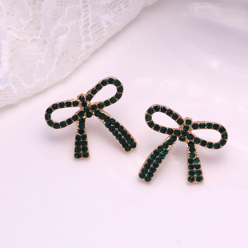 Нарядные серьги-пусеты Сверкающие банты в кристаллах CJH35002