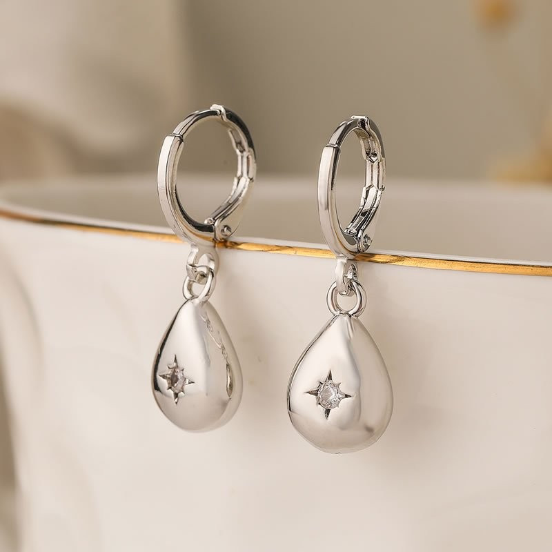 Серебристые серьги-кольца с каплями N99057