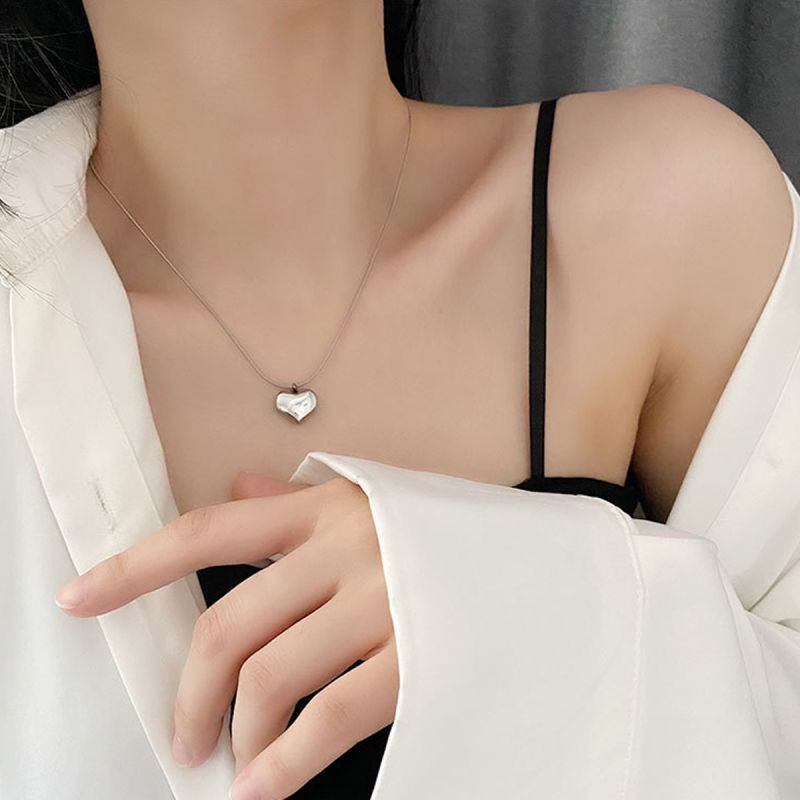 Серебристое колье с сердцем и цепочкой в виде сердца CJX69894