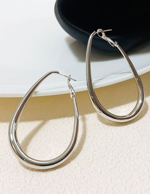 Большие серьги-кольца каплевидной формы из серебристого металла M08975 Большие серьги-кольца каплевидной формы из серебристого металла M08975