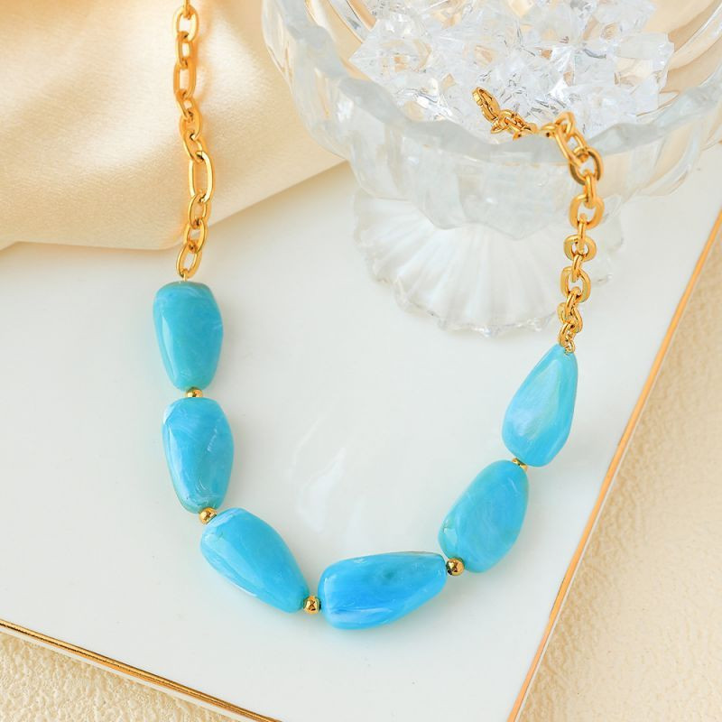 Колье из крупных нежно-розовых камней в золотистой оправе CJP93451 Колье из крупных нежно-розовых камней в золотистой оправе CJP93451