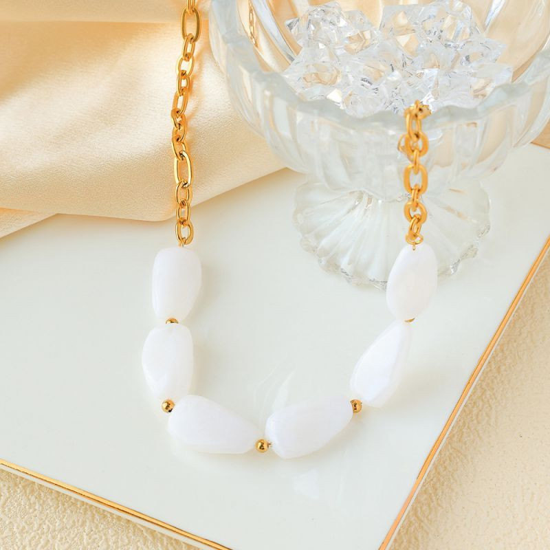 Колье из крупных нежно-розовых камней в золотистой оправе CJP93451 Колье из крупных нежно-розовых камней в золотистой оправе CJP93451