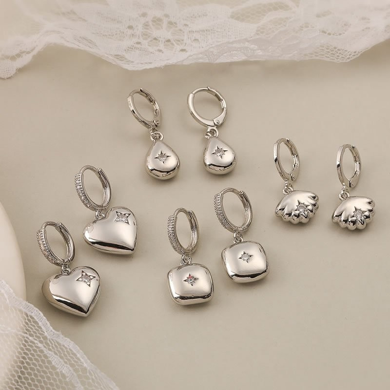 Золотистые серьги-кольца с сердцами N99058