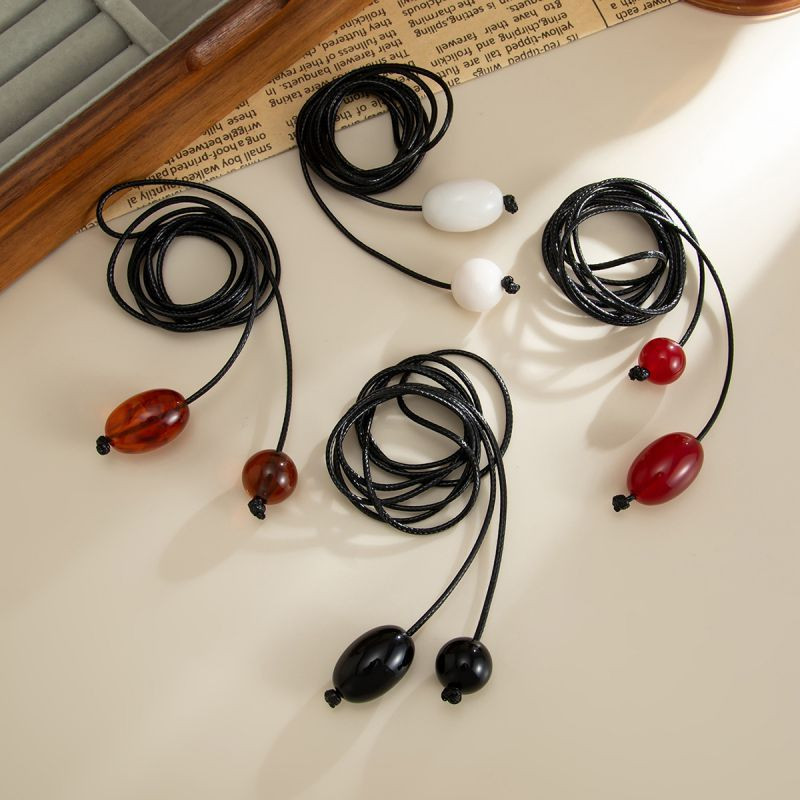 Лариат из тонкого шнура с жемчужными наконечниками CJT25634 Лариат из тонкого шнура с жемчужными наконечниками CJT25634