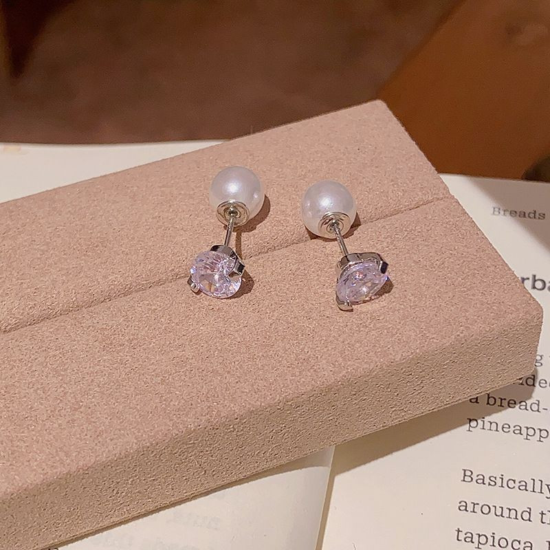 Серебристые серьги с одним цирконом CJX86951