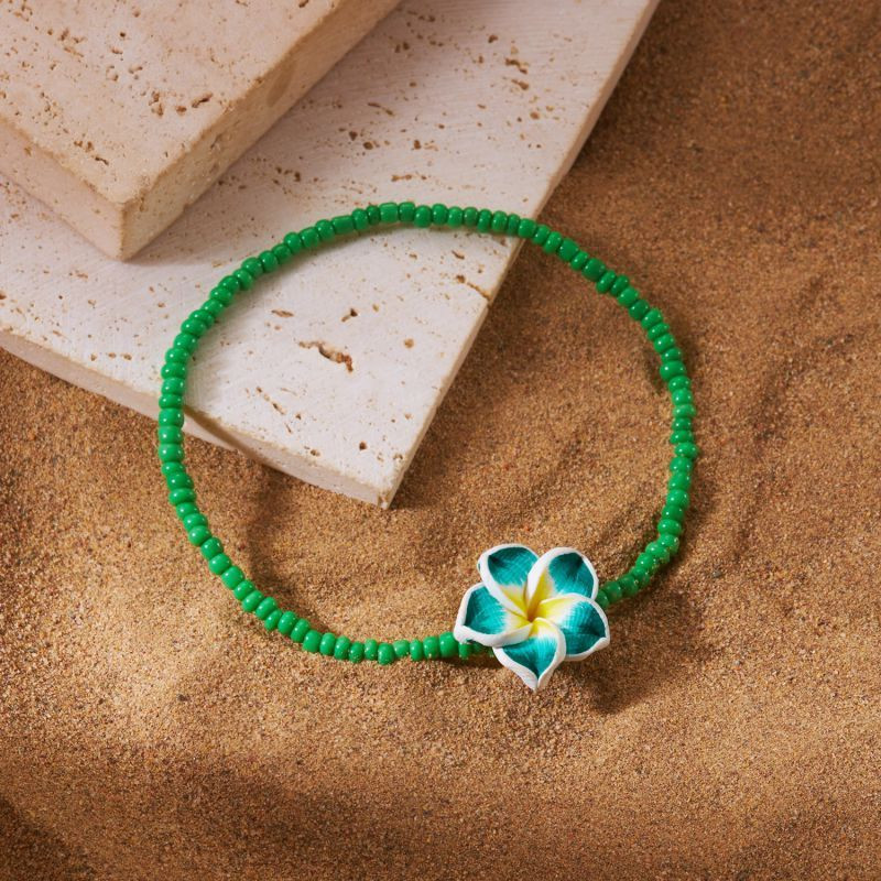 Браслет на ногу из сиреневого бисера с ракушкой CJP54812