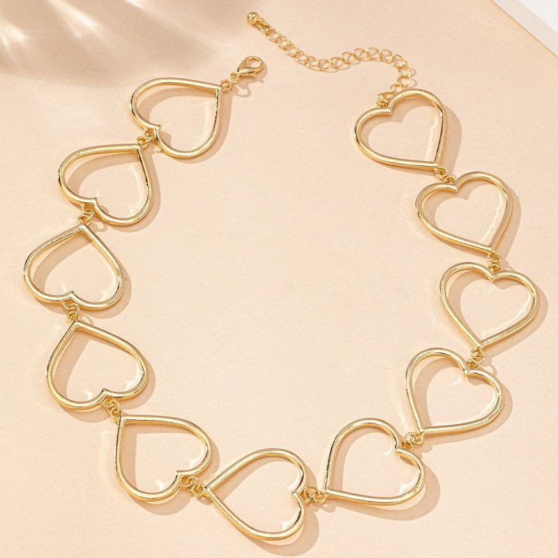 Коллар из крупных золотистых звеньев в форме сердец CJG50970