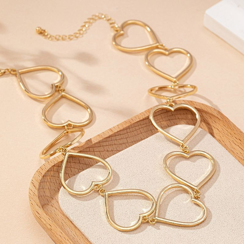 Коллар из крупных золотистых звеньев в форме сердец CJG50970