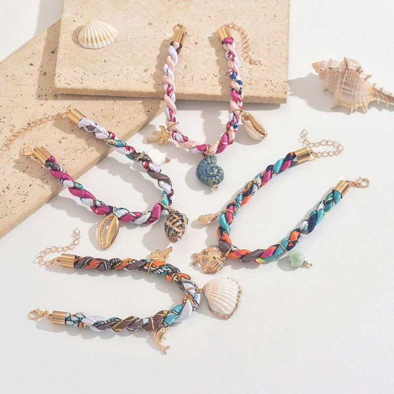 Плетеный многоцветный чокер с золотистыми ракушками и звездой CJR61516