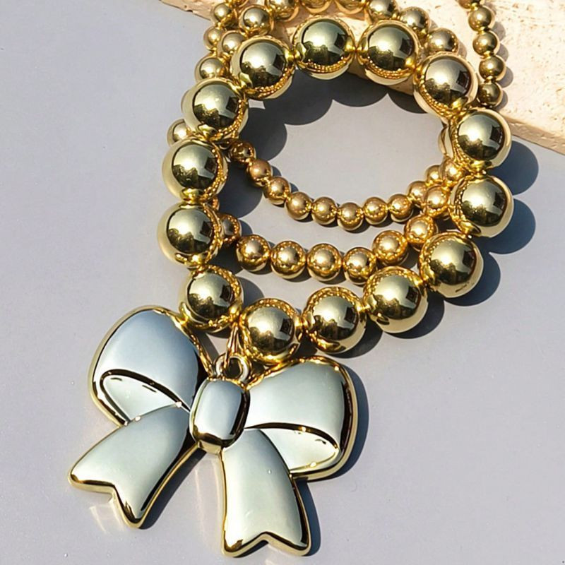 Браслет многорядный из бусин с сердцем CJN32385