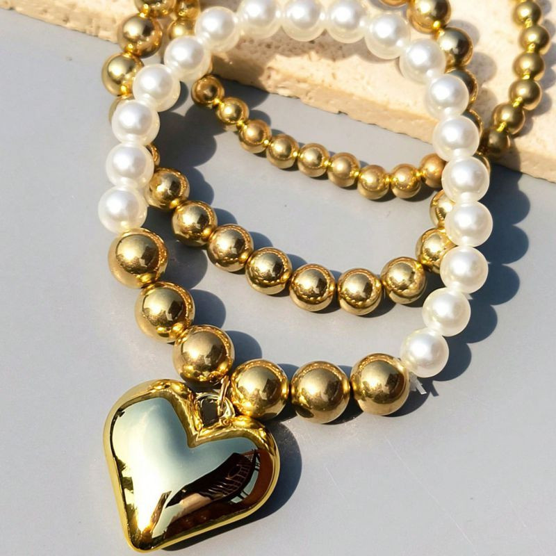 Браслет многорядный из бусин с сердцем CJN32385