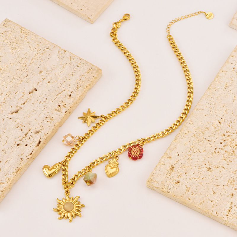 Золотистая цепочка с калейдоскопом цветных подвесок-звезд CJR55571