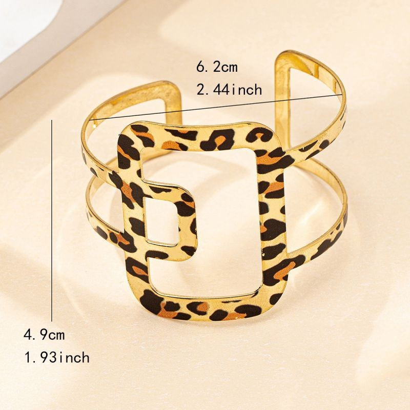 Браслет жесткий широкий кафф с анималистичным принтом CJG50962