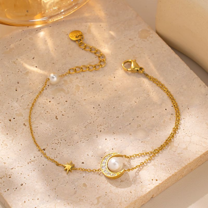 Браслет-цепочка с перламутровой вставкой в золотистом канте CJN40335 Браслет-цепочка с перламутровой вставкой в золотистом канте CJN40335