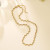 Золотистая цепочка волнообразного плетения CJR55881
