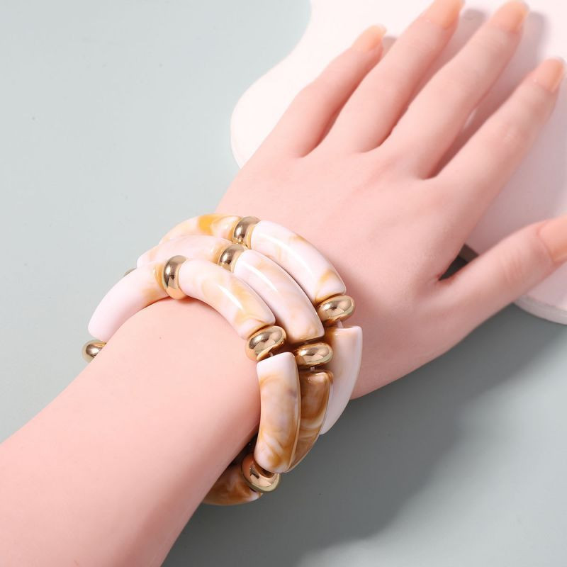 Браслет жесткий сегментированный в цвете марсала CJH23935