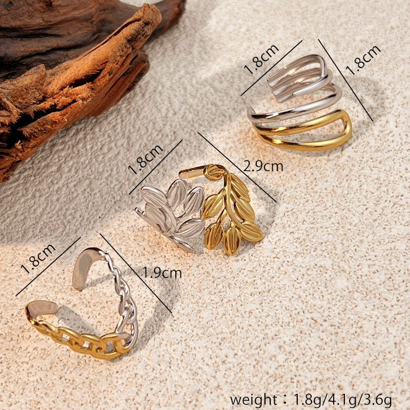 Кольцо разомкнутое из медицинской стали в комбинированном цвете 1J12532CJJ